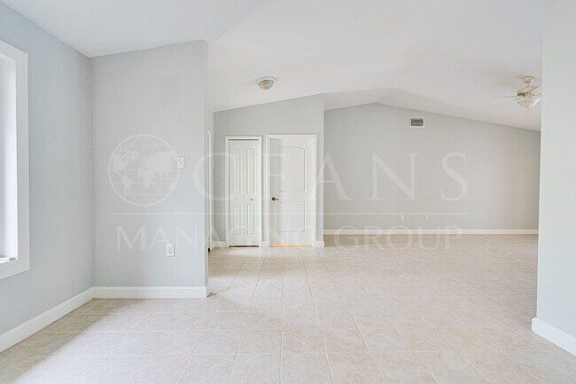 Building Photo - Executive Four-Bedroom Pool Home