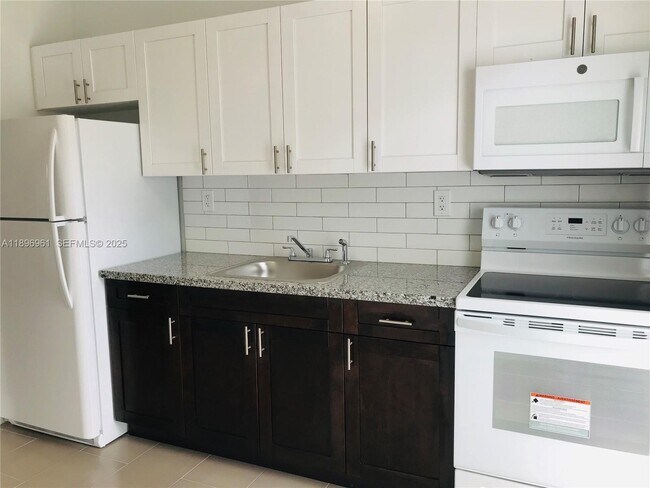 Building Photo - 5454 NW 5th Ave