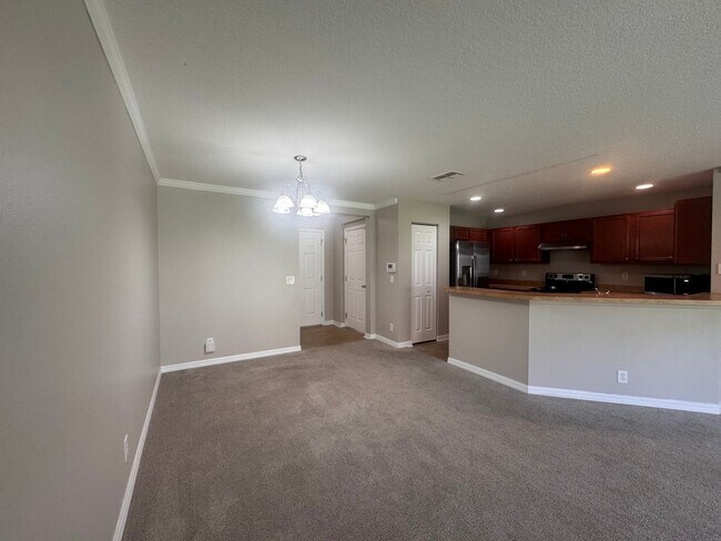 Building Photo - Now Available ! 3BR/2.5BA | Townhome | 1-Car Garage Parking | Community Pool!