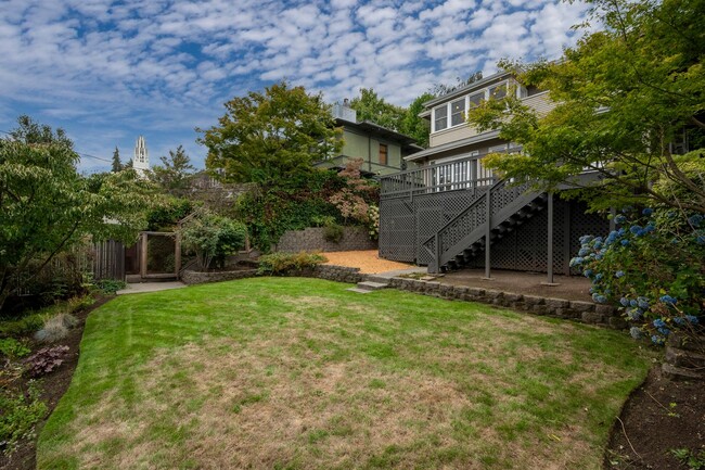 Building Photo - Traditional Four-Corner Craftsman Home on ...