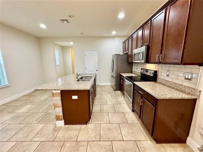 Building Photo - 7208 Milestone Dr
