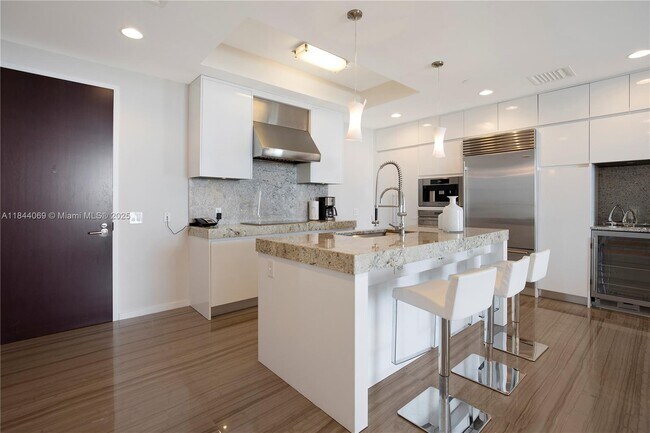 Building Photo - 9705 Collins Ave