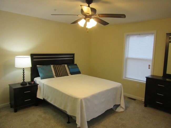 Building Photo - Settle in and cozy up in this comfortable lower-level two-bedroom apartment.