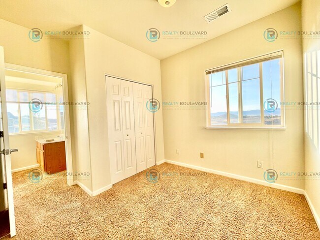 Building Photo - Stunning 3-Bedroom Townhome with Panoramic City Views, Upgraded Kitchen & Spacious Living in Nort...