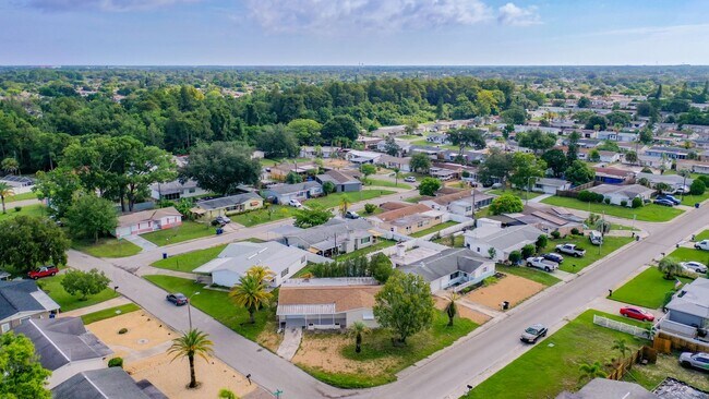 Building Photo - Just Reduced!  2/2/1 with  RENOVATED baths & kitchen, fenced yard, NEW lvp flooring and a OVERSIZ...