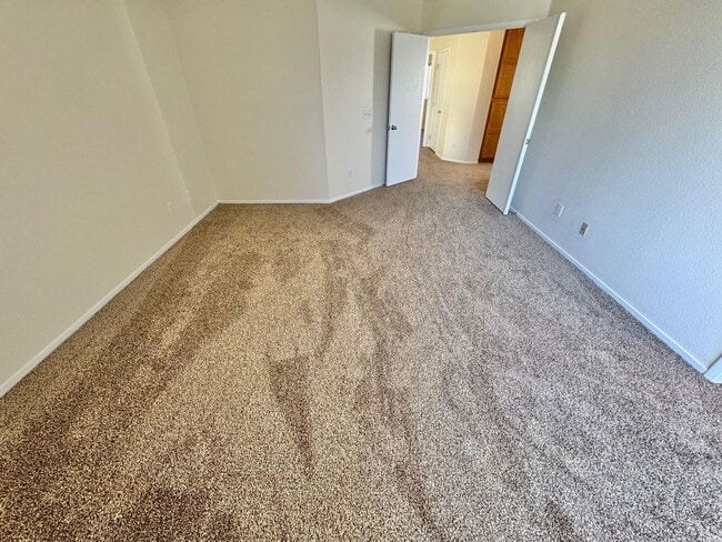 Building Photo - WELCOME TO THIS SPACIOUS 4-BEDROOM, 2.5-BA...