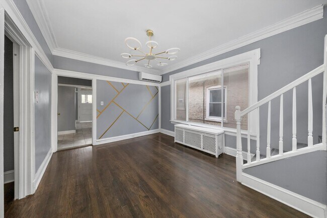 Building Photo - 7643 S Paxton Ave