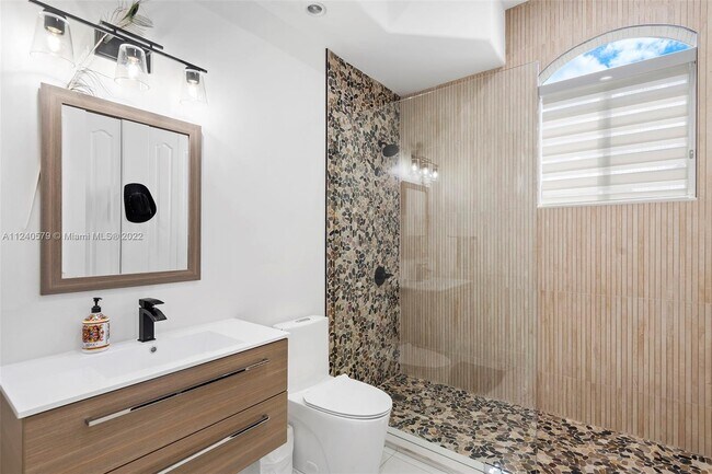 Building Photo - 5801 Melaleuca Rd