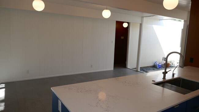 Building Photo - BEAUTIFUL UPDATED FOUR BED / TWO BATH PLUS OFFICE EICHLER HOME WITH GREAT OUTDOOR SPACE