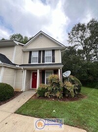Building Photo - Cute TWO STORY Town Home!