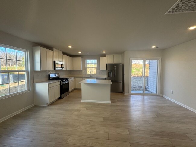 Building Photo - Brand New 3/2.5 Townhome Available In Reidville - Ready To Move In!