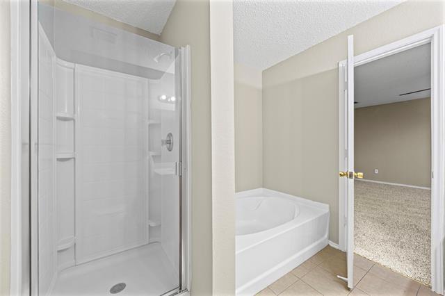 Building Photo - 8409 Redheart St