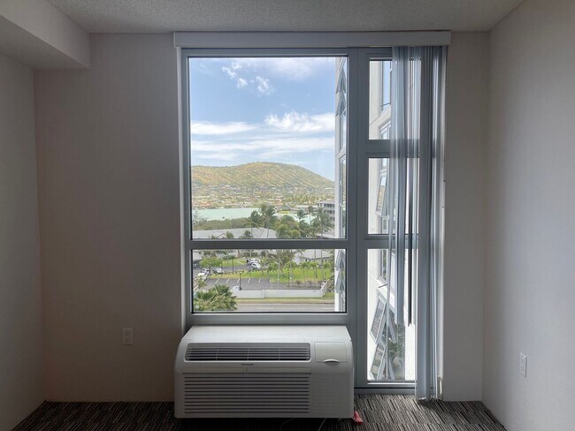Building Photo - Come live with us at Hale Ka Lae! 2x2