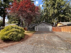 Building Photo - Orchards Ranch with Large Fenced Yard - Re...