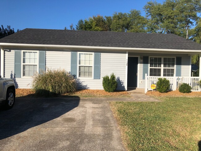 Front of house with easy access with one step into the house. - 1138 Timothy Ave