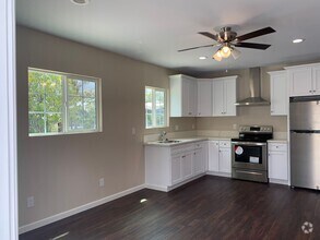 Building Photo - Super-Spacious-Super cute 1+1  ADU Apartme...
