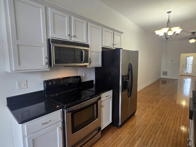 Building Photo - "Chic 2-Bed, 2-Bath Condo with Granite and...