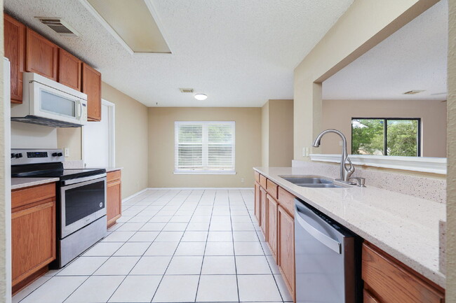 Building Photo - Spacious 3-Bedroom Home with Game Room and...