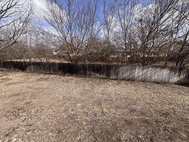 Building Photo - Generous Outdoor Space & Lawn Care Included!