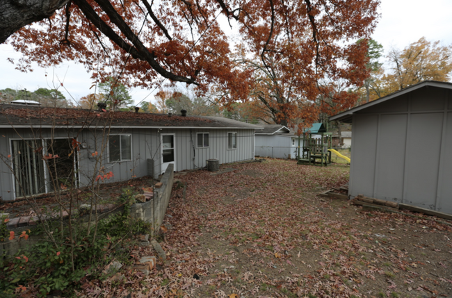 Building Photo - Two-bedroom, one-bathroom home