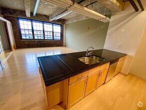 Building Photo - Stunning Industrial-Contemporary One Bedro...