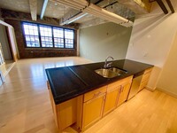 Building Photo - Stunning Industrial-Contemporary One Bedro...