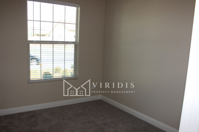 Building Photo - 5901 Blue Spruce Ave