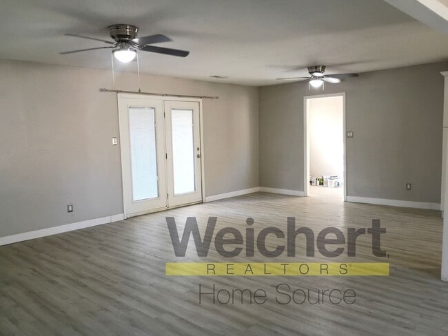 Building Photo - Updated 4-Bed Home with Fenced Yard & Carport