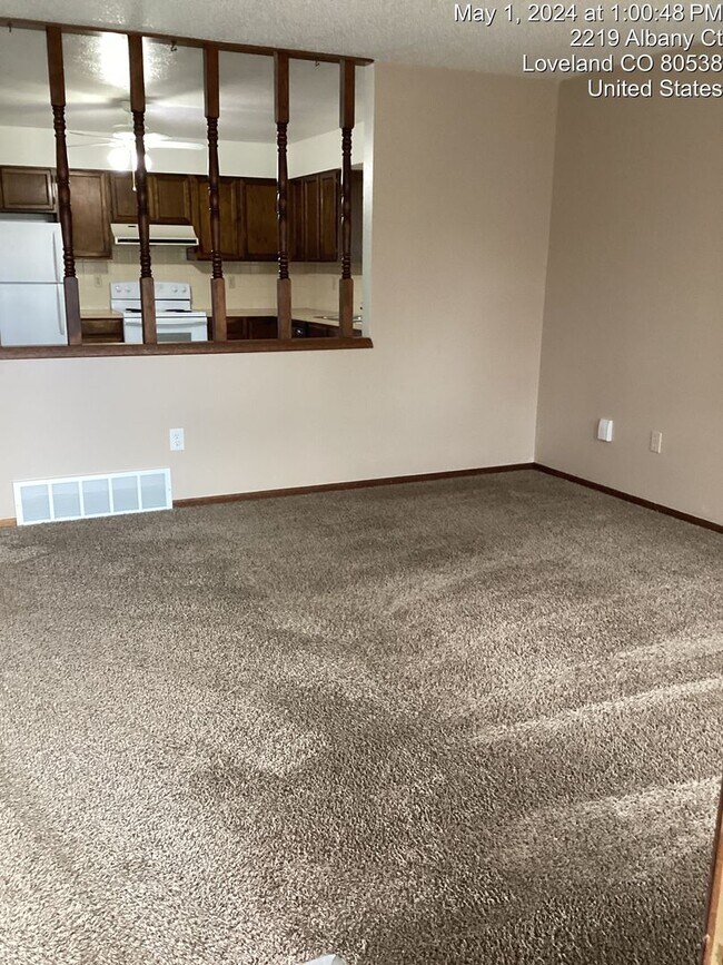 Building Photo - Great 2 Bed, 1 Bath Duplex with Attached Garage in Northern Loveland