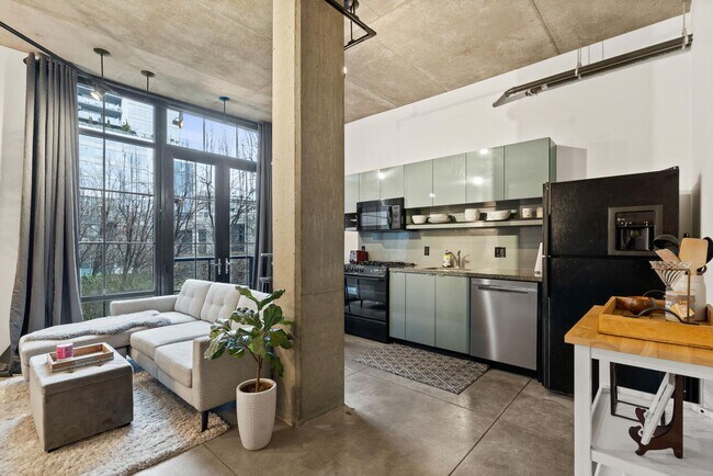 Building Photo - **FURNISHED** Streetcar Lofts studio w/parking/storage/Juliette balcony/fitness center/courtyard ...