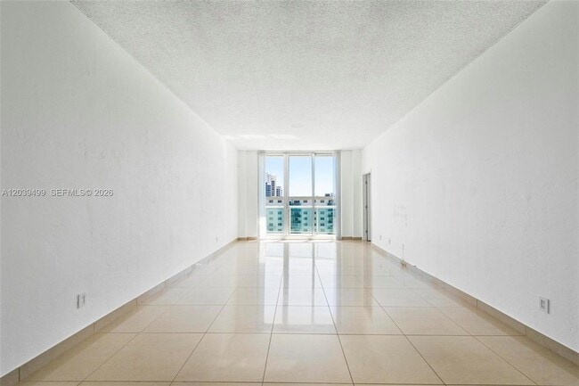 Building Photo - 19380 Collins Ave