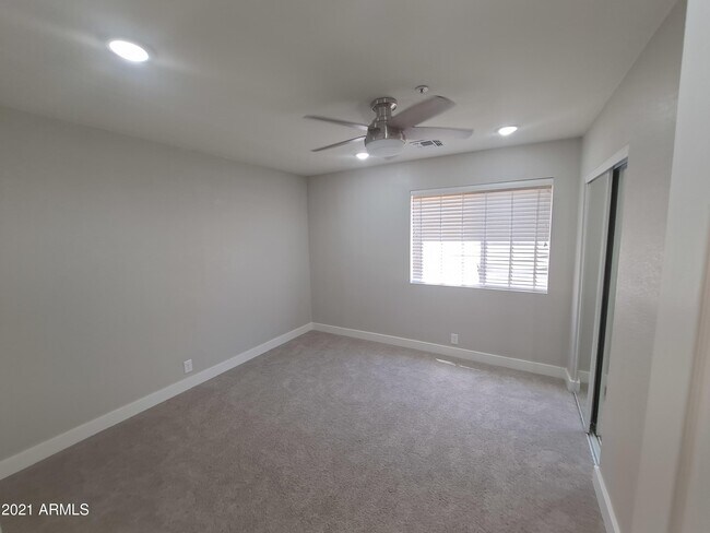 Building Photo - 9074 E Caribbean Ln