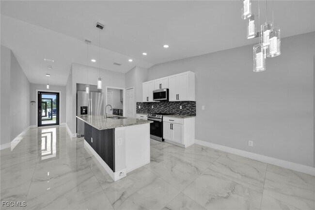 Building Photo - 3095 NW 4th Pl