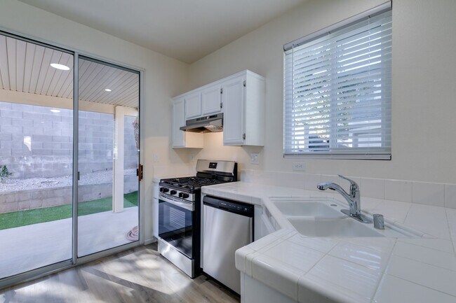 Building Photo - SUMMERLIN BEAUTY*UPGRADED*COMMUNITY POOL*3 BEDROOMS*STAINLESS STEEL APPLIANCES*