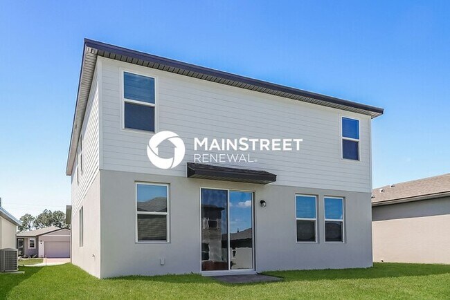 Building Photo - 4 Bedroom Pet-Friendly Home in Davenport, FL with Main Street Renewal