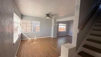 Building Photo - 2-Bedroom Townhome with Wood Floors