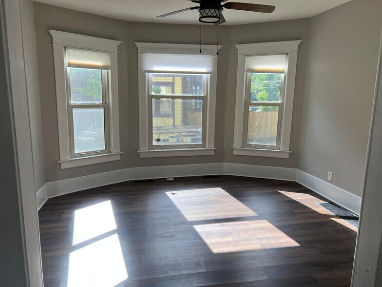 Large dining room with Ceiling Fan Lights - 244 E Oakland Ave