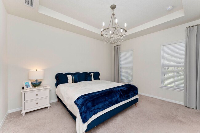 Building Photo - Introducing a captivating 3-story townhome...
