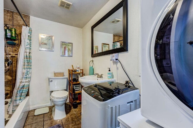 Building Photo - Fully Furnished Long Beach Retreat with Private Spa & Outdoor Entertaining Area
