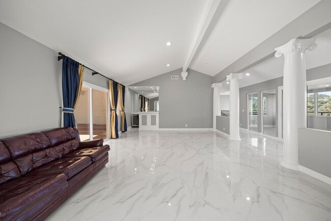 Building Photo - Modern Elegance Meets Scenic Privacy in Be...