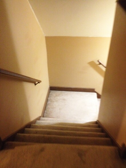 Staircase to second level - 2597 N Murray Ave