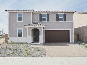 Building Photo - MOVE IN SPECIALS!! 15 DAYS RENT FREE!! New 5-Bedroom Home in Phoenix with Upgrades!