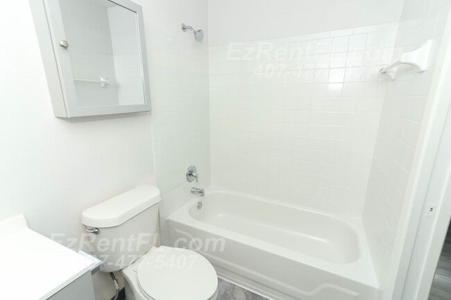 Building Photo - Summer Special! Charming 2 Bed/2 Bath Vill...