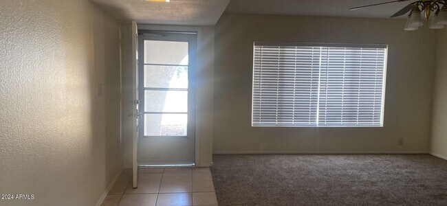 Building Photo - 10019 N 48th Dr