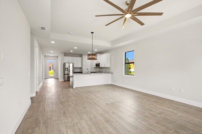 Building Photo - Brand New Canal-Front Pool Home for Rent, 3/2/2, NE Cape Coral. The Builder Didn't Cut Corners, S...
