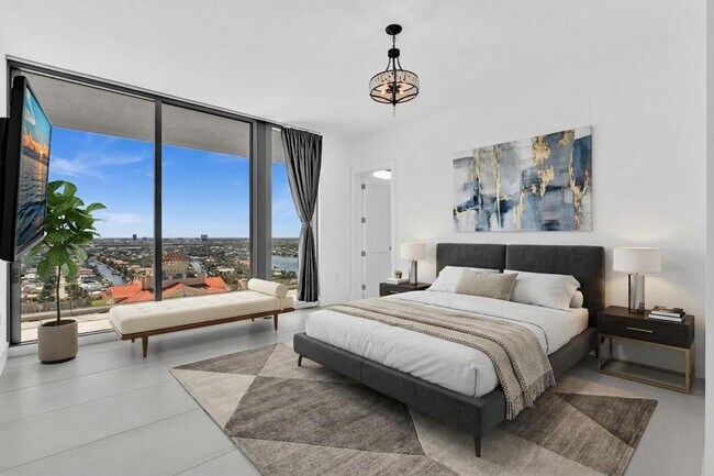 Building Photo - Stunning High-Rise Condo with Ocean Views | Prime Beach Location