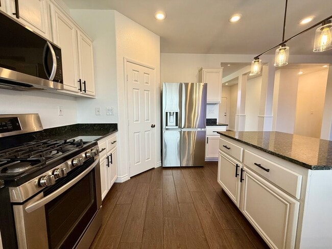 Building Photo - COMING SOON 5/BD 3/BA Home W/ Expansive Yard, Solar Panels, and No Rear Neighbors!