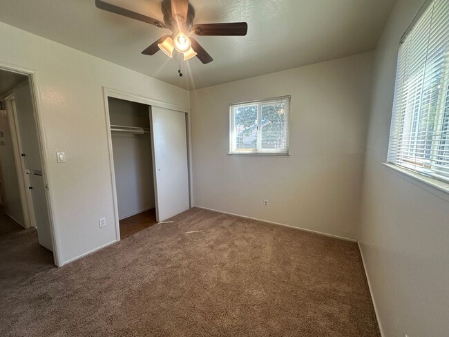 Building Photo - Three Bedroom Two Bathroom Home with Yard