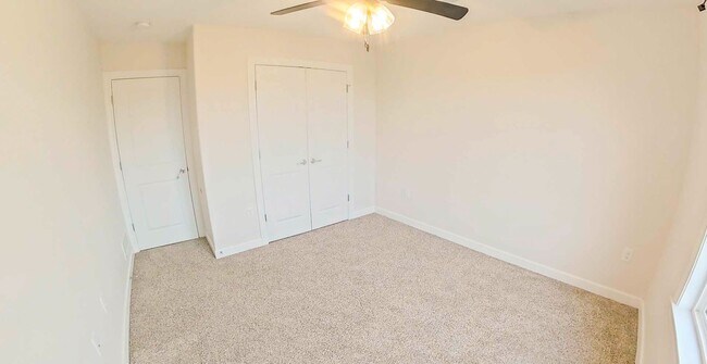 Building Photo - Newly Built! + Stainless Steel Appliances + 3-Car-Garage + Large Backyard + Washer & Dryer Includ...