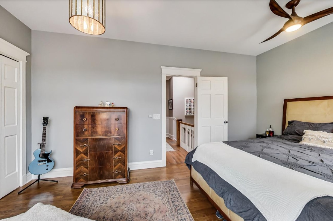 Primary bedroom (guitar not included!) - 719 S Claremont Ave
